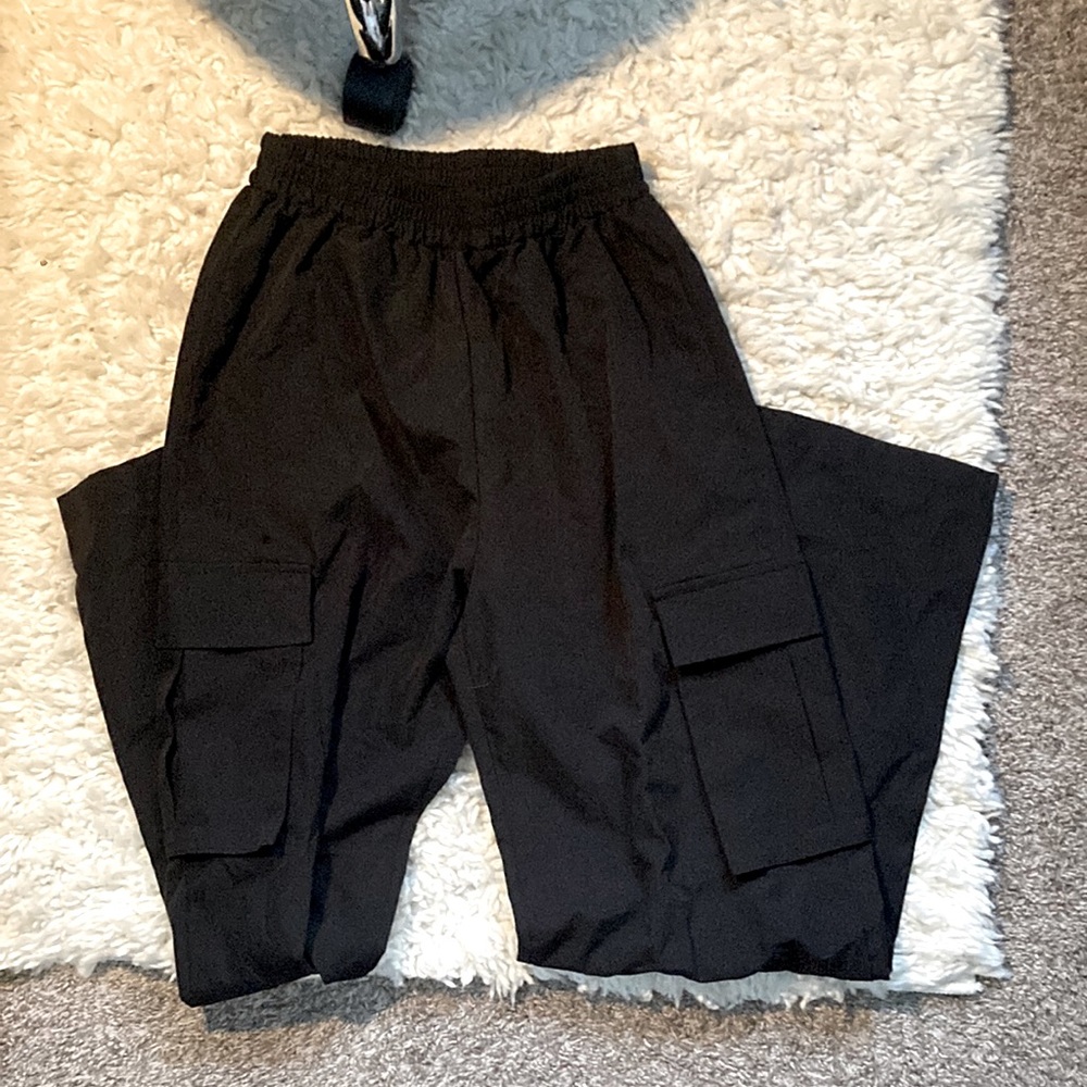 Black cargo pants, never worn, great condition.